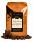5 lb J.L. Hufford Mackinac Island Fudge coffee bag with coffee beans and fudge blocks on a white background