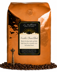 5 lb J.L. Hufford Seattle's Finest Blend coffee bag with coffee beans and space needle on a white background