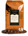 5 lb J.L. Hufford Turtle Sundae coffee bag with coffee beans, pecans, chocolate covered caramel candies, and ice cream with drizzled caramel and fudge on a white background
