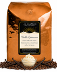 5 lb J.L. Hufford Vanilla Buttercream coffee bag with coffee beans, vanilla sticks, and bowl of buttercream on a white background