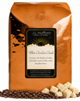 5 lb J.L. Hufford White Chocolate Chunk coffee bag with coffee beans and white chocolate chunks on a white background