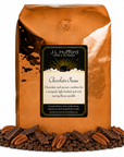 5 lb coffee bag labeled 'Chocolate Pecan' with chocolate pecan flavor, surrounded by coffee beans, chocolate, and pecans on a white background.