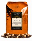 5 lb J.L. Hufford Macadamia Nut Coffee with coffee beans and macadamia nut in front displayed on a white background
