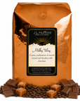 5 lb J.L. Hufford Milky Way coffee bag with coffee beans, chocolate, and blocks of caramel on a white background