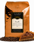 5 lb J.L. Hufford Pecanilla coffee bag with coffee beans and a slice of buttery pecan pie on a white background