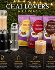 Chai Lovers gift pack with blender, travel bottle, and chai latte packages on a dark surface.