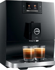 Black coffee machine with two glasses of coffee on a white background