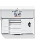 An open white presentation box containing cold brew equipment parts, including clear glass or acrylic rods and a small black component, with printed text and a QR code on the inside lid.