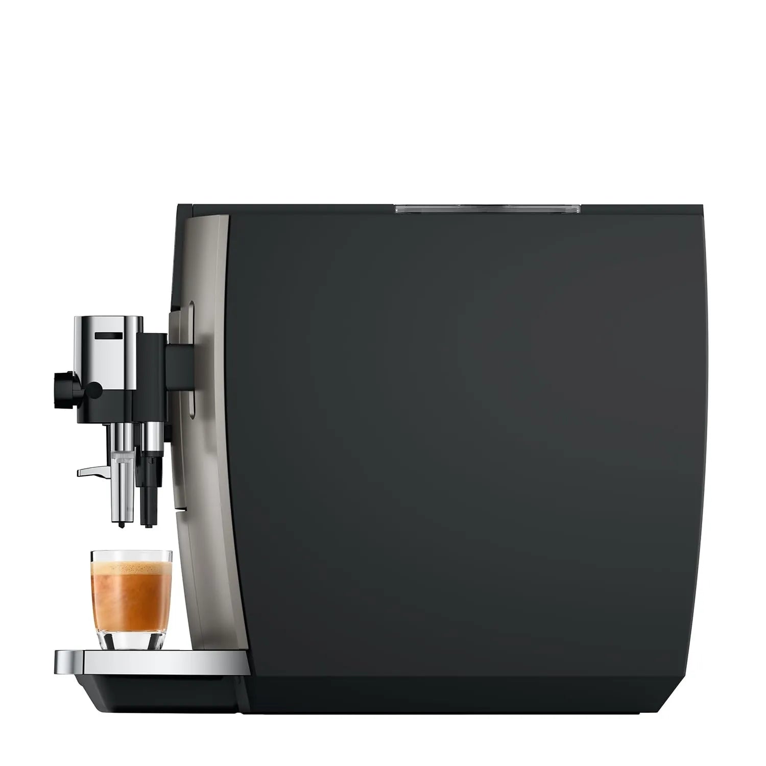 A modern espresso machine with a matte black body and brushed silver metallic accents, shown with a glass of espresso on the drip tray against a plain white background.
