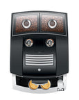 Top view of black coffee machine with coffee beans inside a bean hopper on a white background