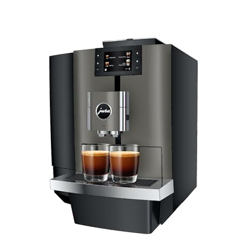 A modern Jura commercial-style coffee machine in dark gray and black, shown with two glasses of espresso on the front tray against a plain white background.