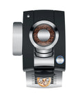 Top view of black and silver Jura coffee machine with coffee bean grinder with a clear lid showing coffee beans on a white background