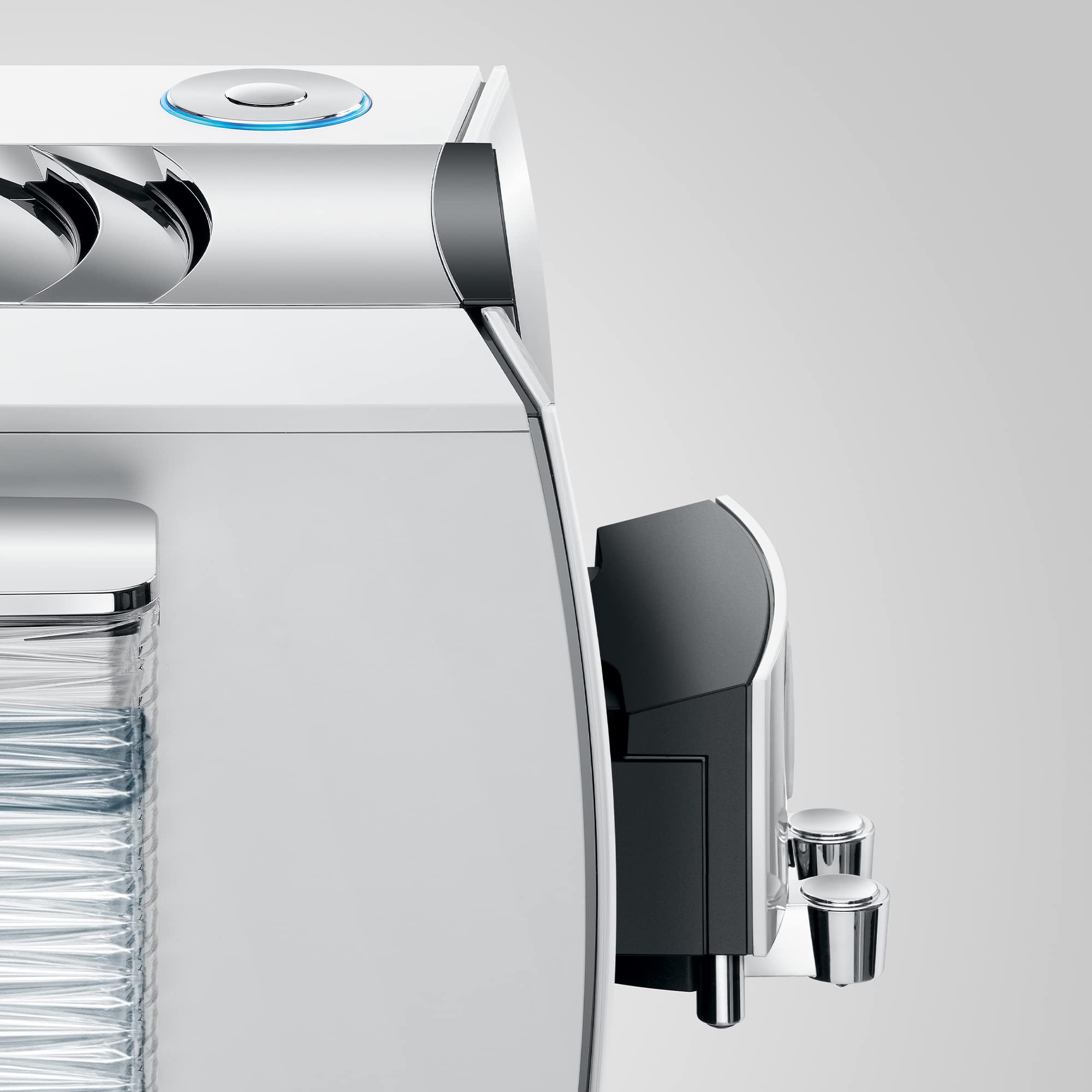 Side view of Diamond White Jura espresso machine displayed on a white background