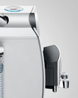 Side view of Diamond White Jura espresso machine displayed on a white background