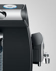 Side view of Diamond Black Jura espresso machine displayed on a white background