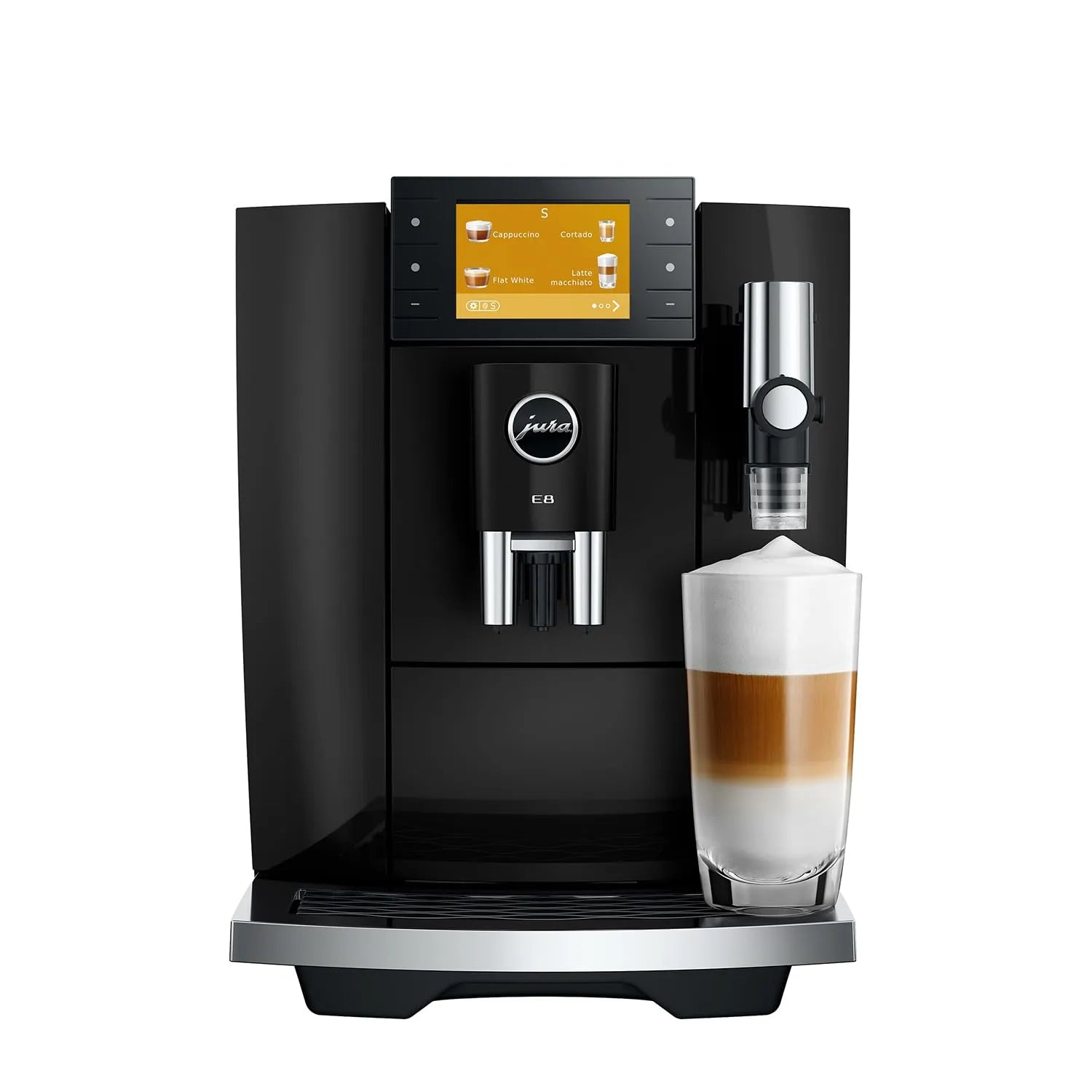 A black and silver Jura coffee machine with a digital touch screen, shown with a glass of layered latte macchiato on a white background.