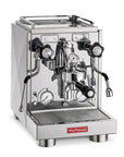 A professional stainless steel espresso machine by la Pavoni, featuring a polished chrome finish, dual pressure gauges, steam wands, and a drip tray, shown on a solid white background.