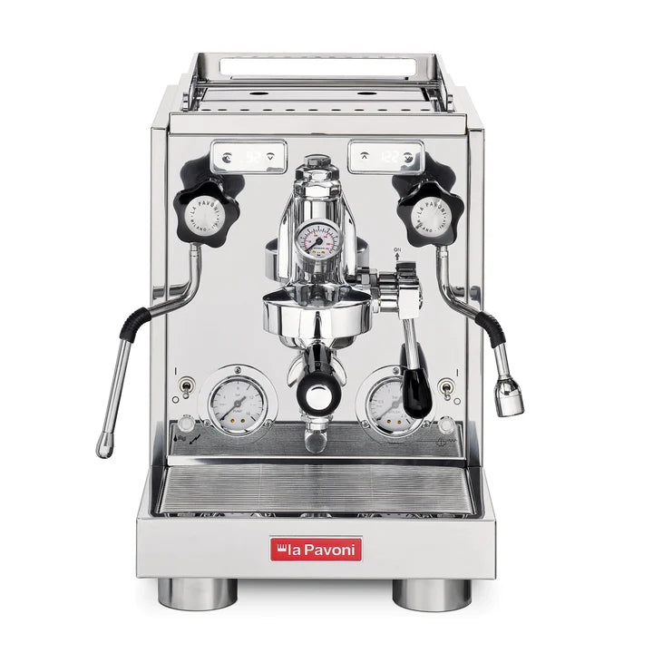 Front view of a professional La Pavoni espresso machine in polished stainless steel with black accents, featuring two side handles, pressure gauges, a central pump assembly, and a red brand badge on the front base.