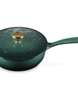 Green saucier with leaf decoration on lid with gold knob and handle