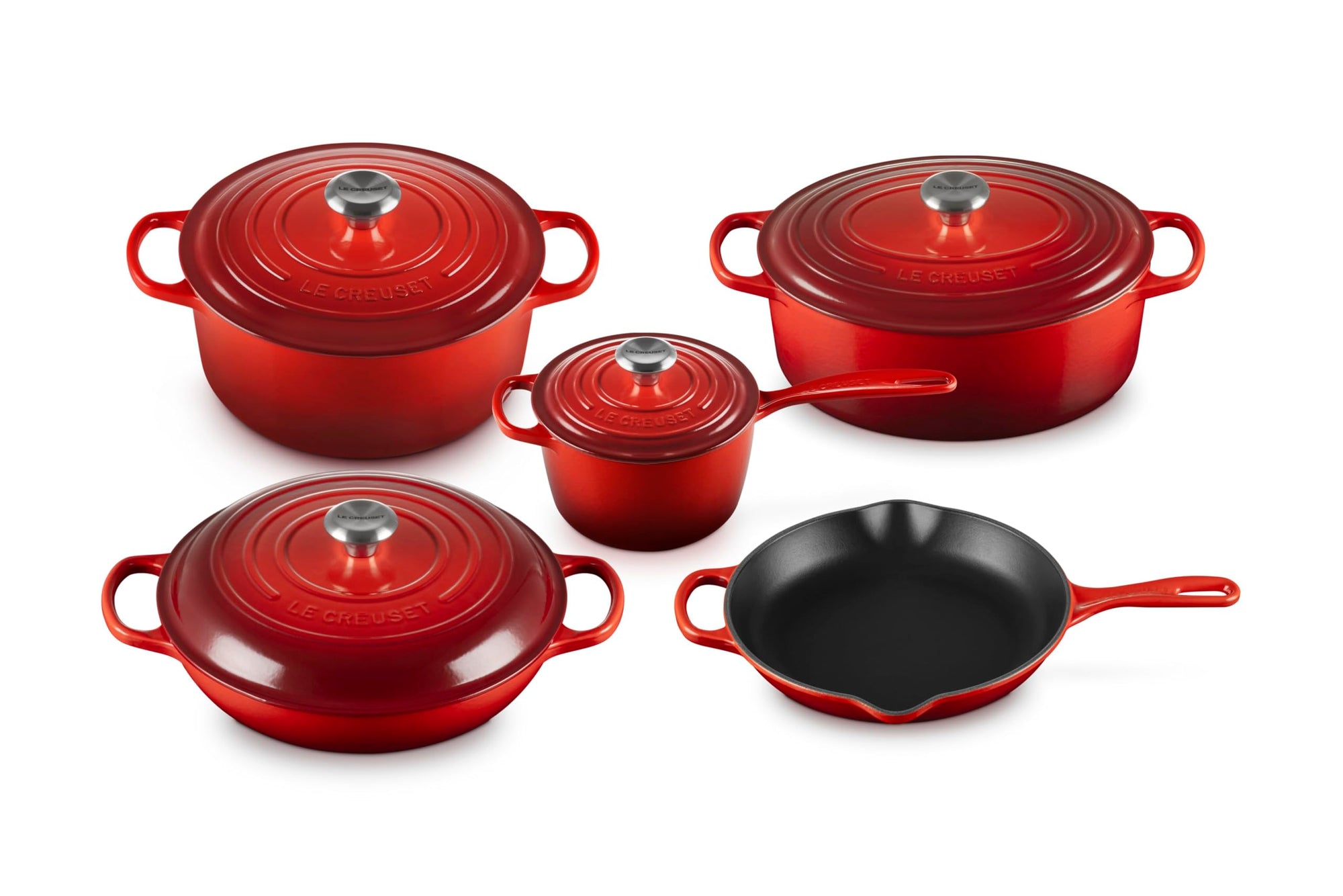 Set of 5 cerise cookware with lids  on a white background