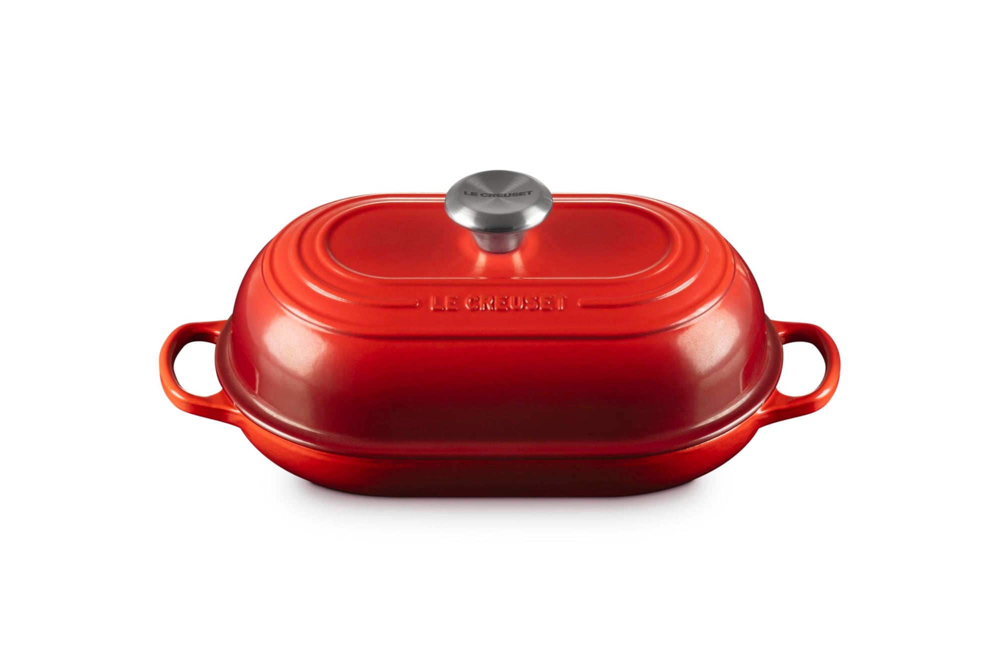 Cerise bread oven pan with lid and handles displayed on a white background