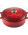 3.5 qt cerise Le Creuset Signature Round Wide Dutch Oven with a lid displayed on a white background