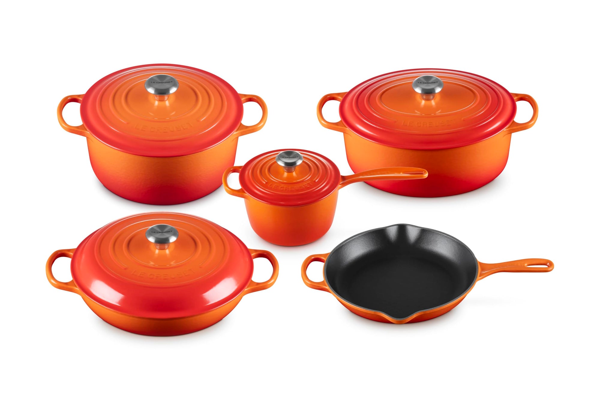Set of 5 flame cookware with lids  on a white background