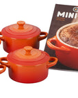 Flame Le Creuset Set of 4 Cocottes w/ Mini-Cocotte Cookbook displayed on a white background