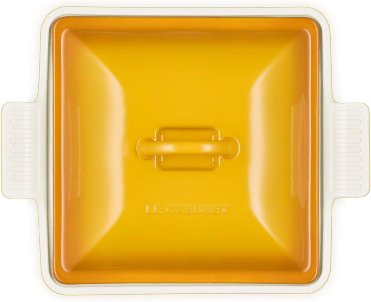 Top view of a Nectar Le Creuset 2.5 qt (9-Inch) Stoneware Heritage Covered Square Casserole displayed on a white background