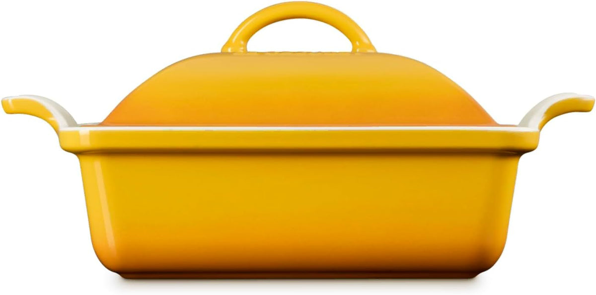Side view of a Nectar Le Creuset 2.5 qt (9-Inch) Stoneware Heritage Covered Square Casserole displayed on a white background