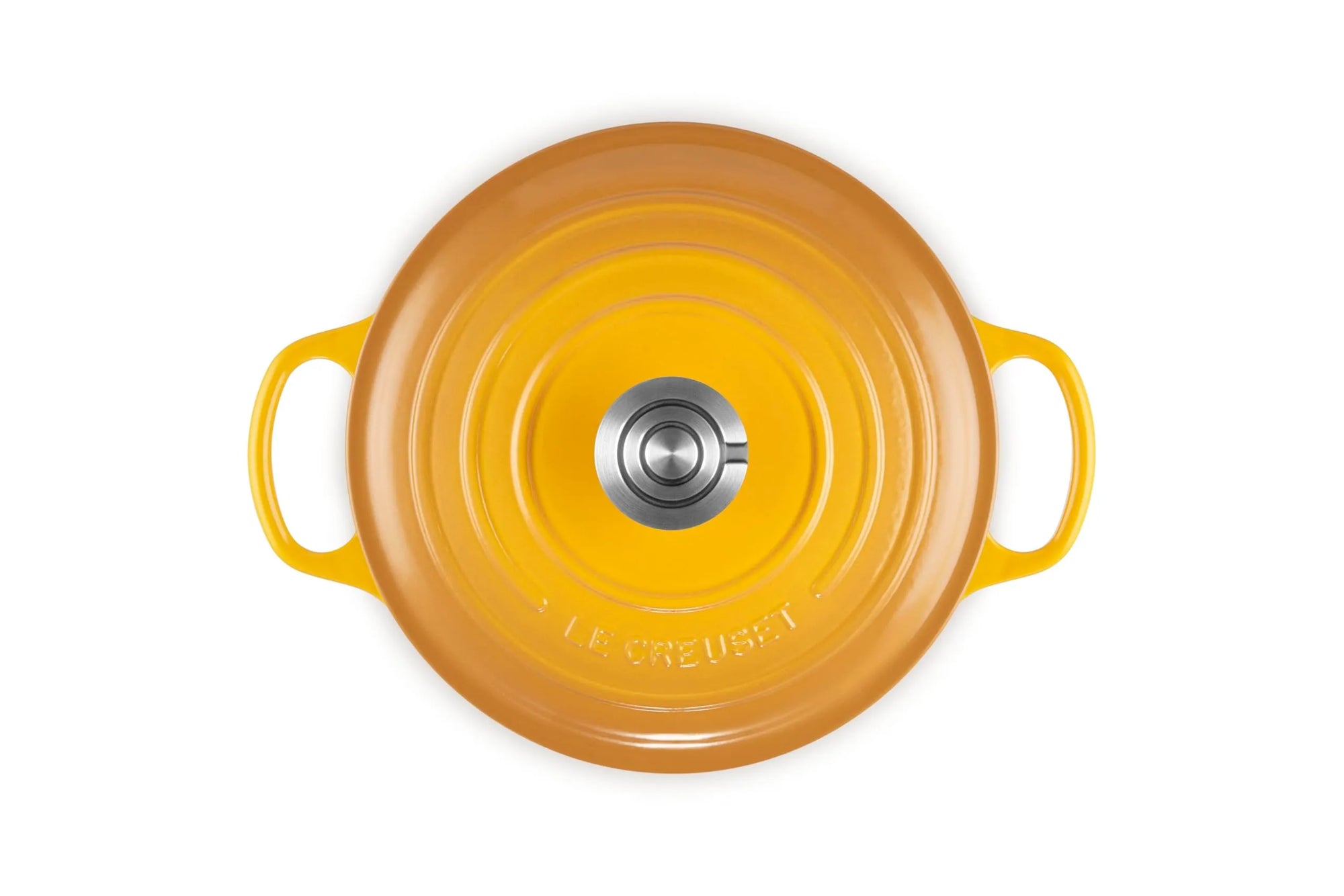 Top-down view of a Le Creuset round enameled cast iron pot or Dutch oven with yellow-orange exterior and bright yellow handles, shown on a plain white background.