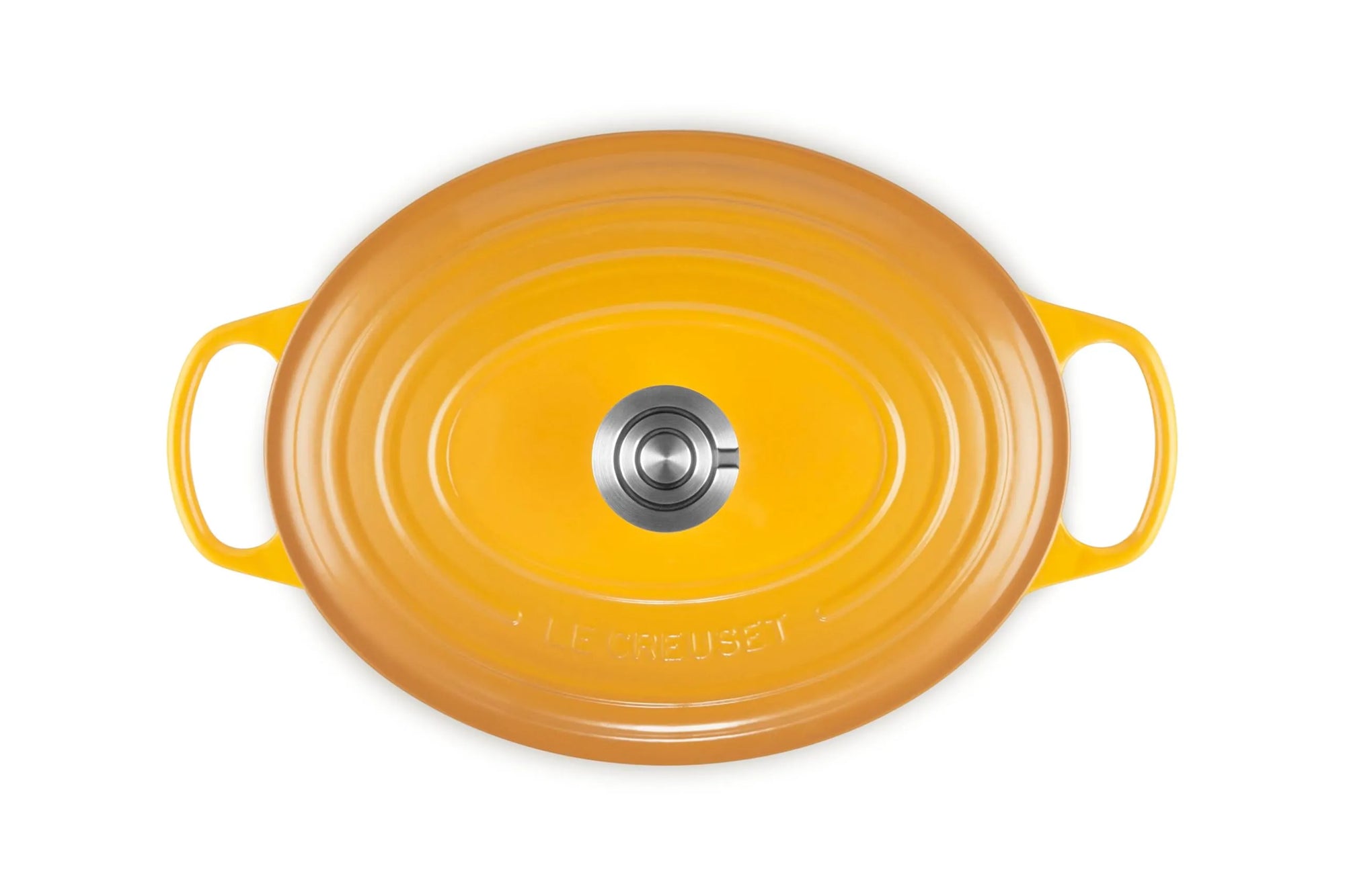 An oval yellow enameled cast iron Dutch oven lid with side handles and a central silver metal knob, photographed from a top-down perspective on a white background.