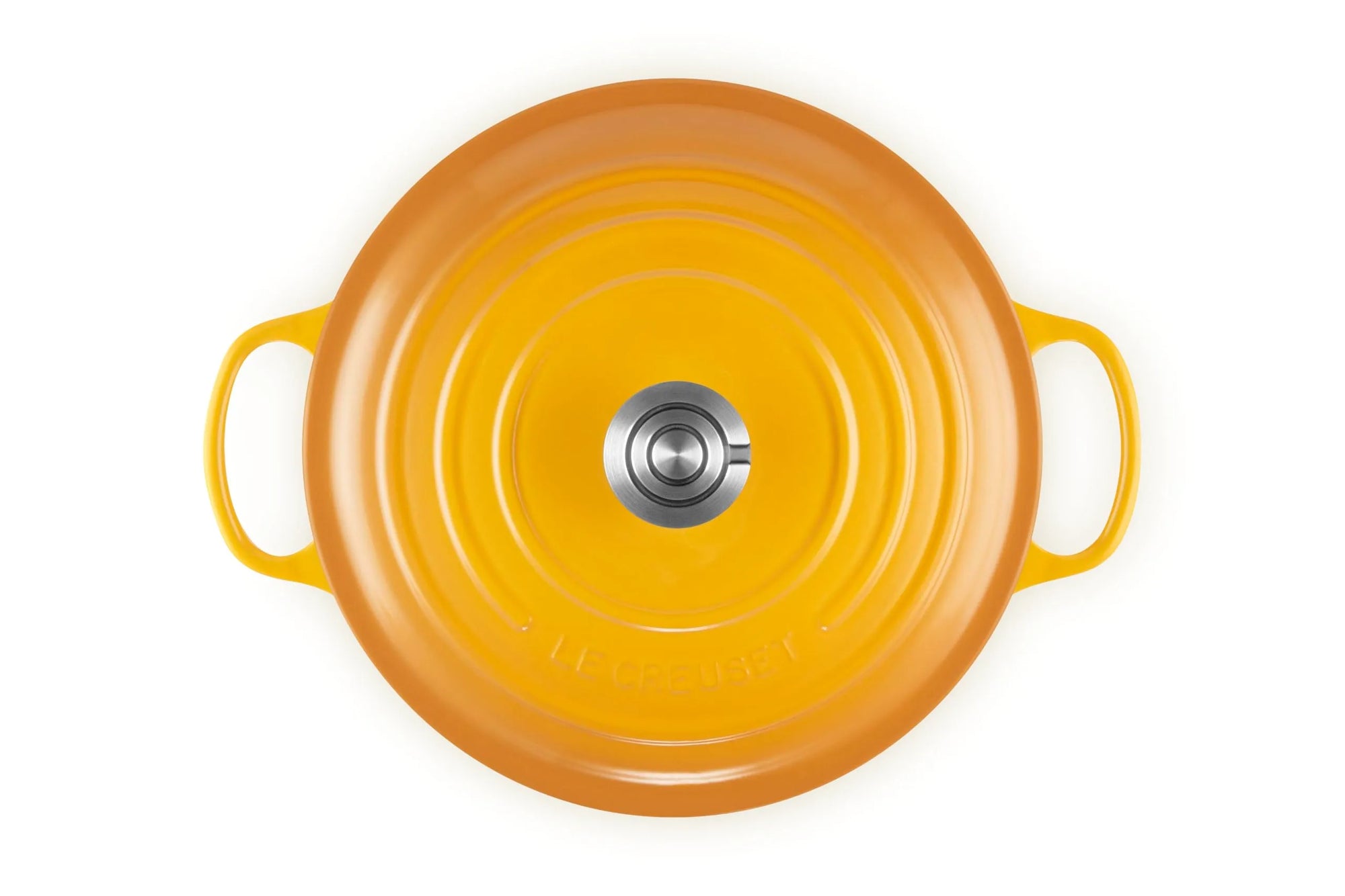 A top-down view of a bright yellow-orange enameled cast iron pot or Dutch oven with two side handles and a matching lid, set against a plain white background.