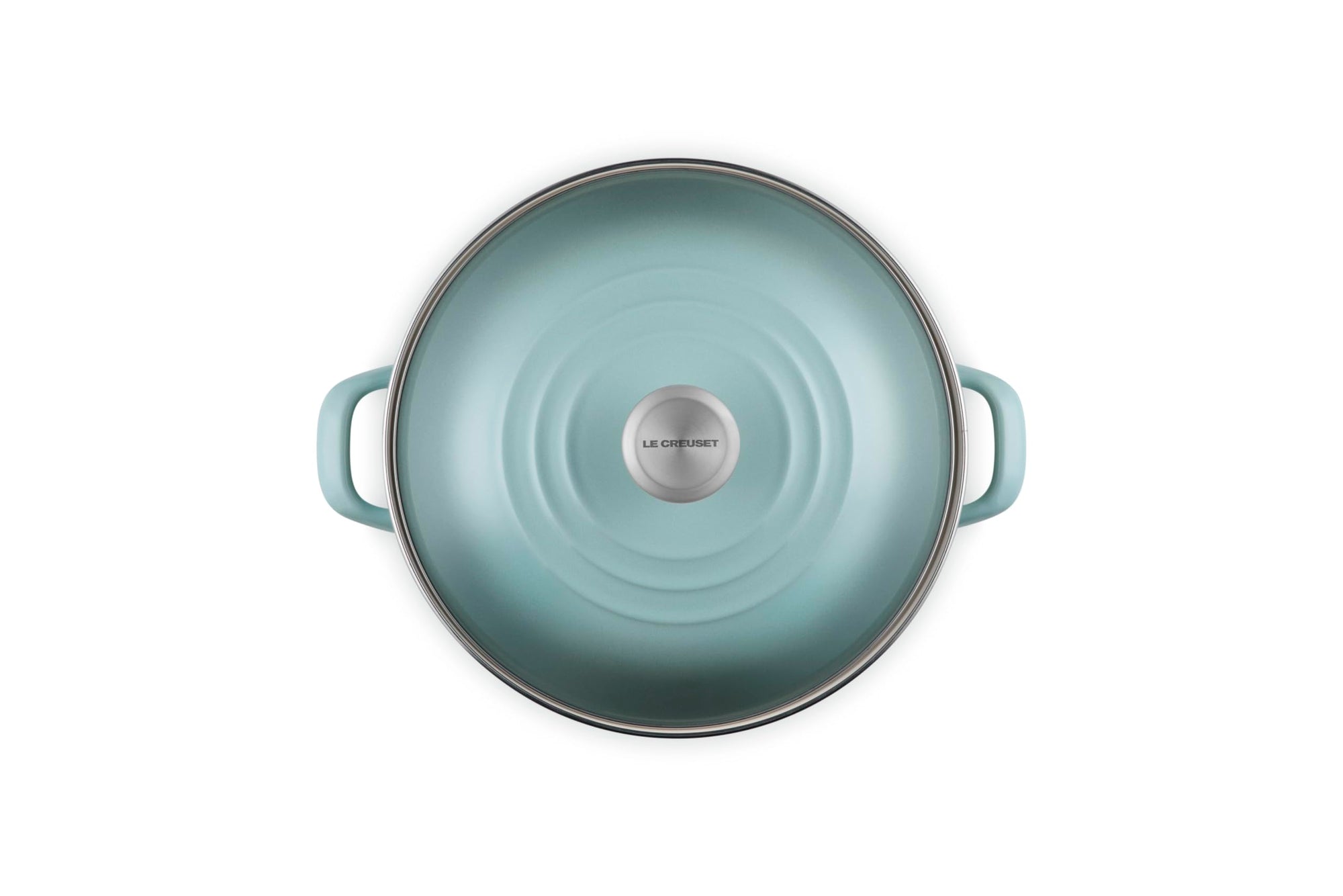 Top view of sea salt pot and sea salt lid on a white background