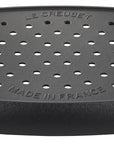Black grill pan with handles on a white background, featuring 'Le Creuset' branding.