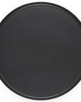 Black cast iron skillet with handles on a white background