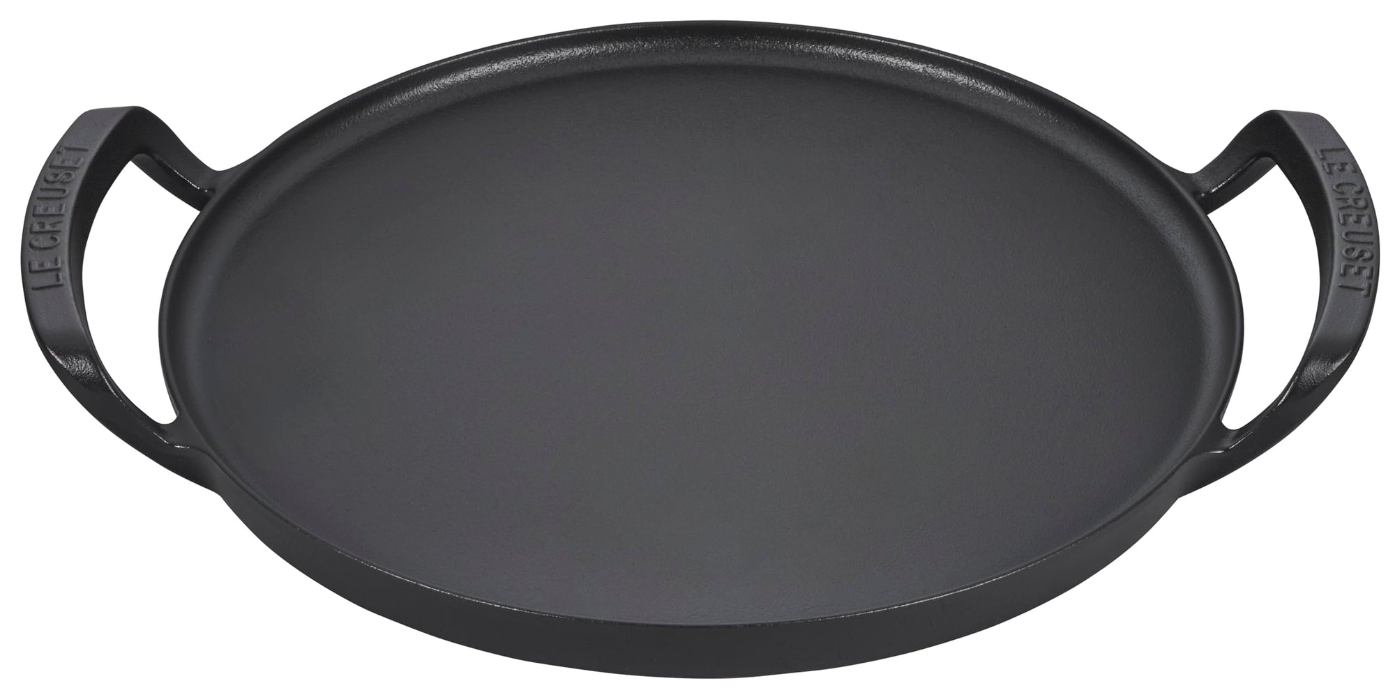 Black cast iron skillet with handles on a white background