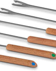 Six barbecue skewers with long stainless steel forks and wooden handles in different colors, arranged diagonally on a white background.