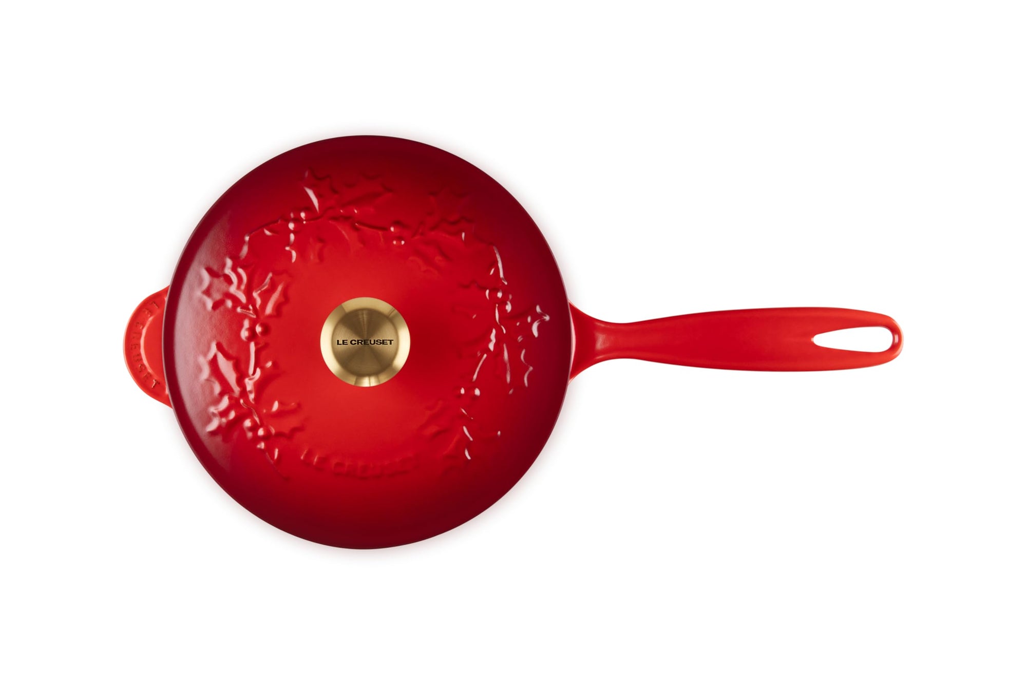 Red saucier with leaf decoration on lid with gold knob and handle