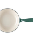 Green saucier with light interior and handle