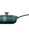 Green saucier with lid with gold knob and handle