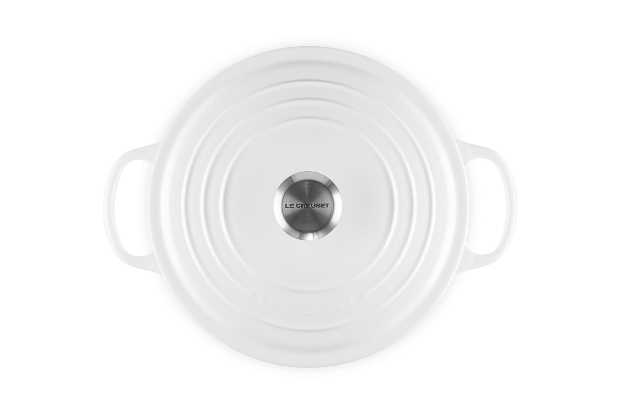 White enameled cast iron cookware pot with lid on a white background