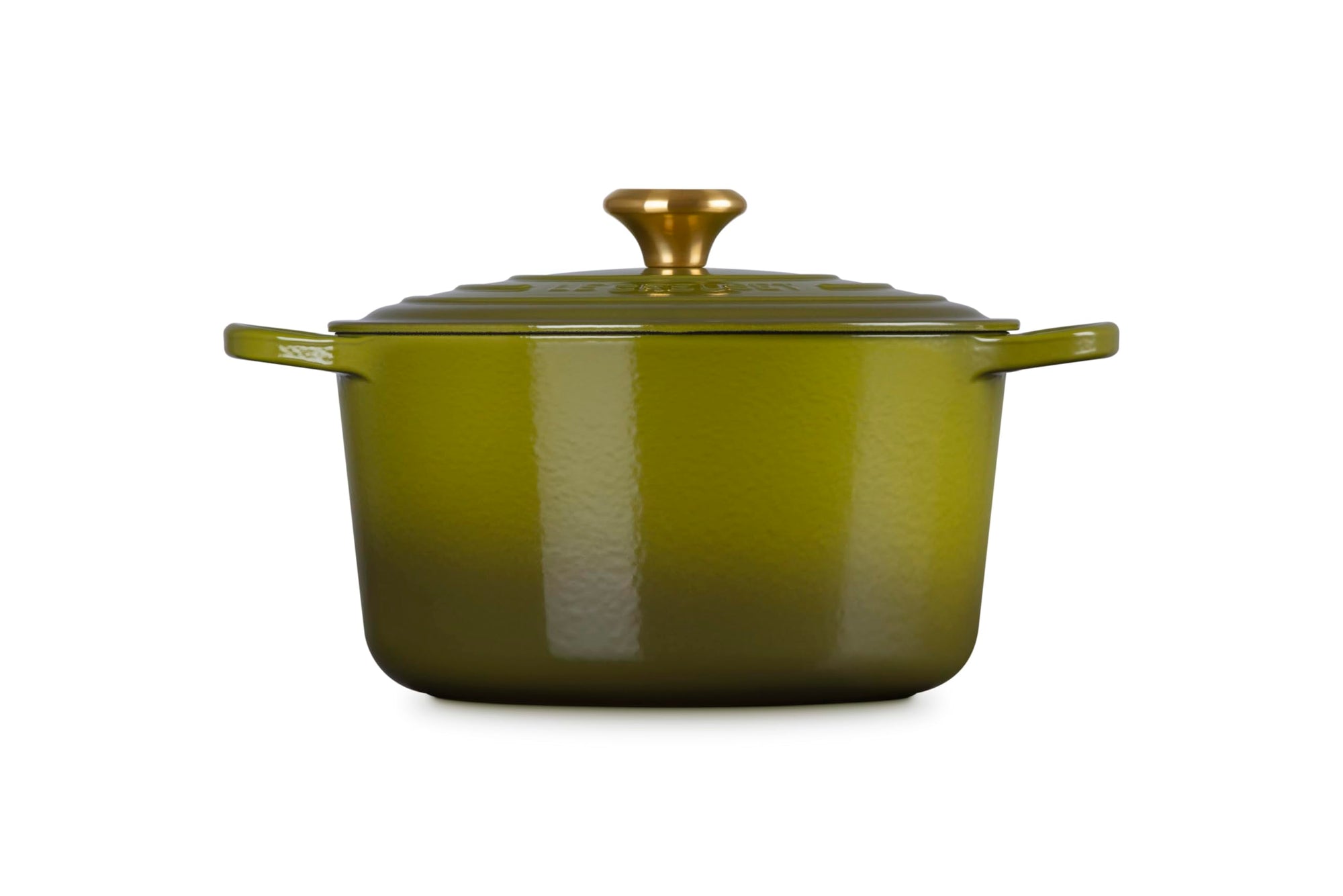 Olive enameled cast iron Dutch oven with a lid on a white background