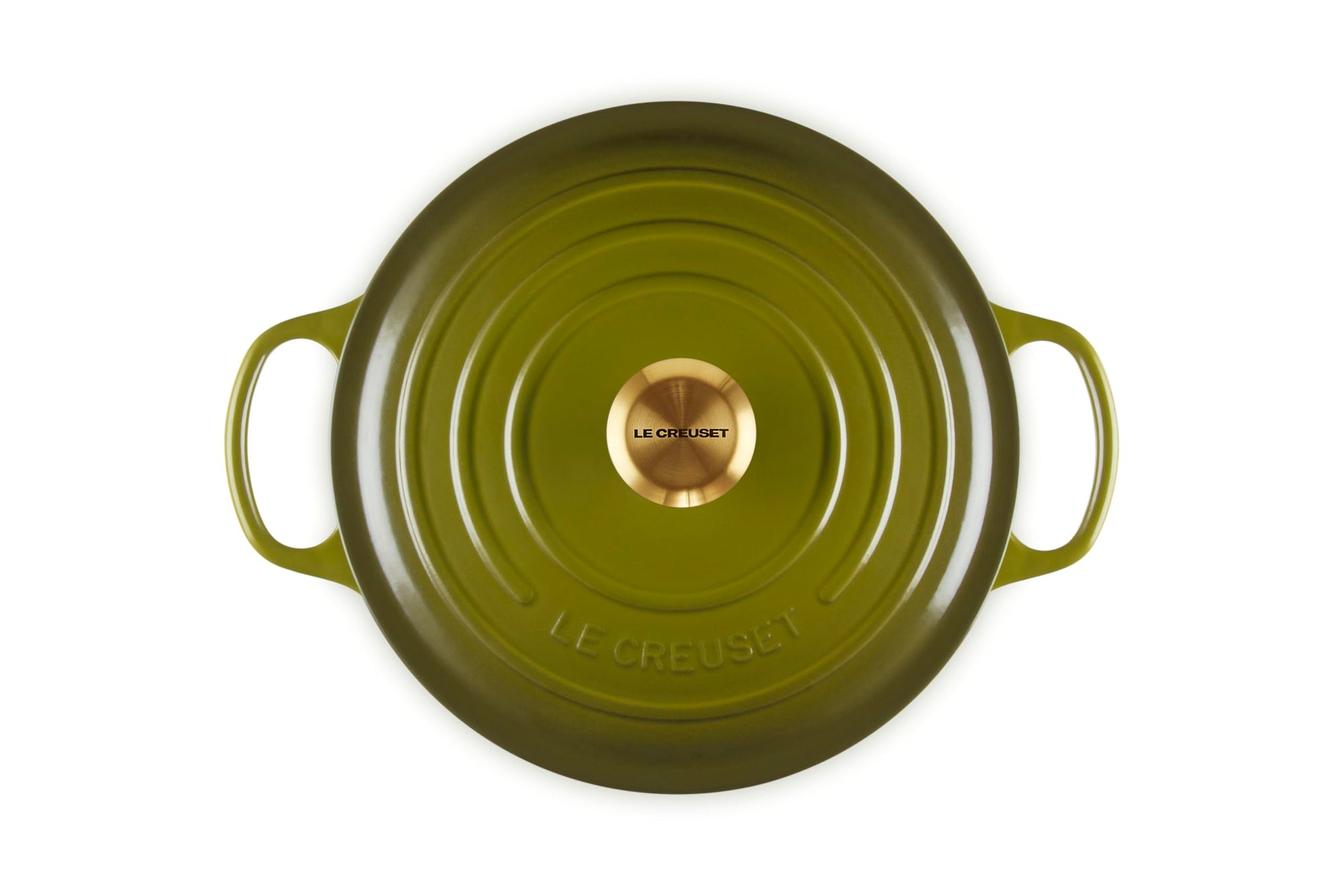 Olive Le Creuset dish on a white background