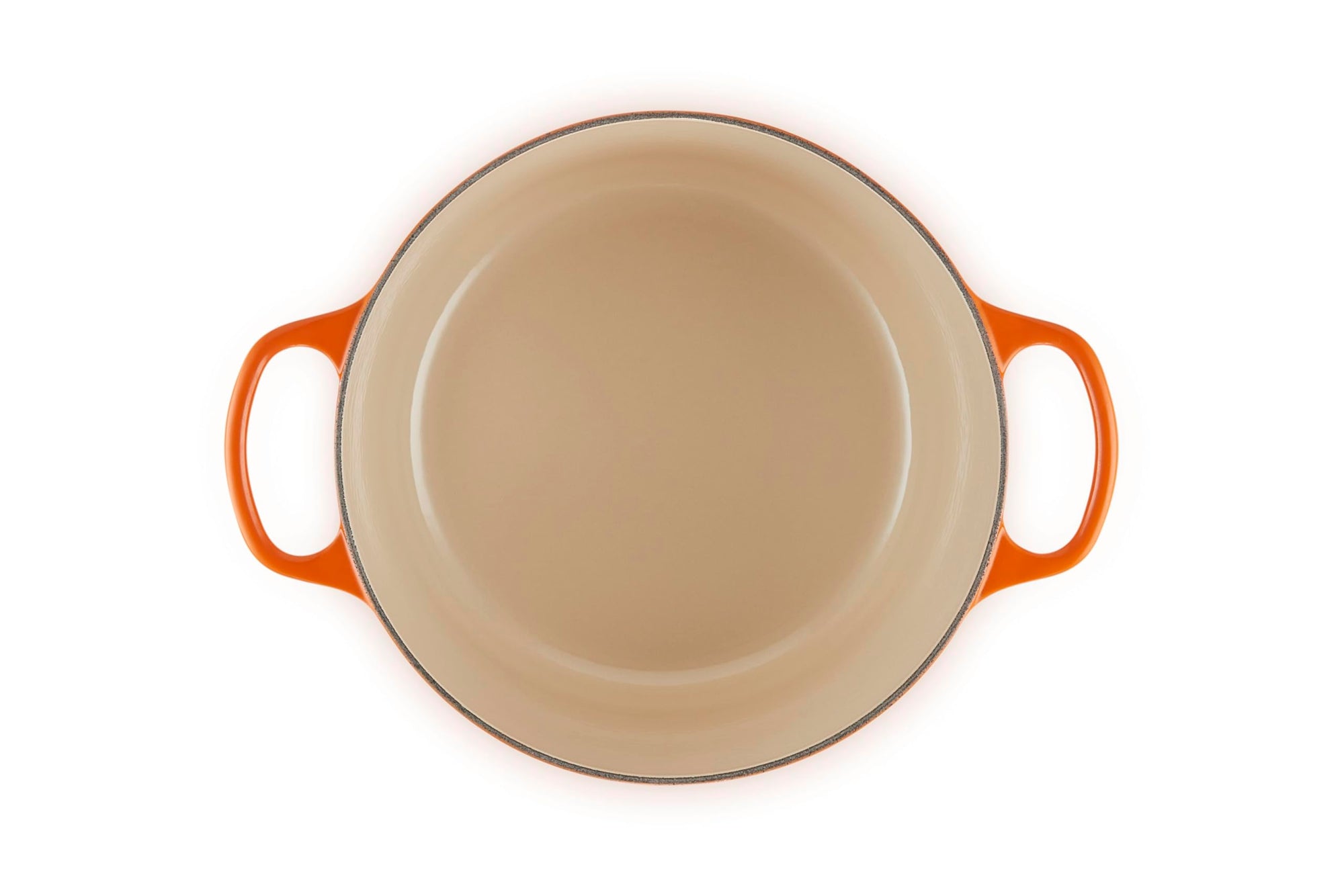 Round beige dish with orange handles on a white background