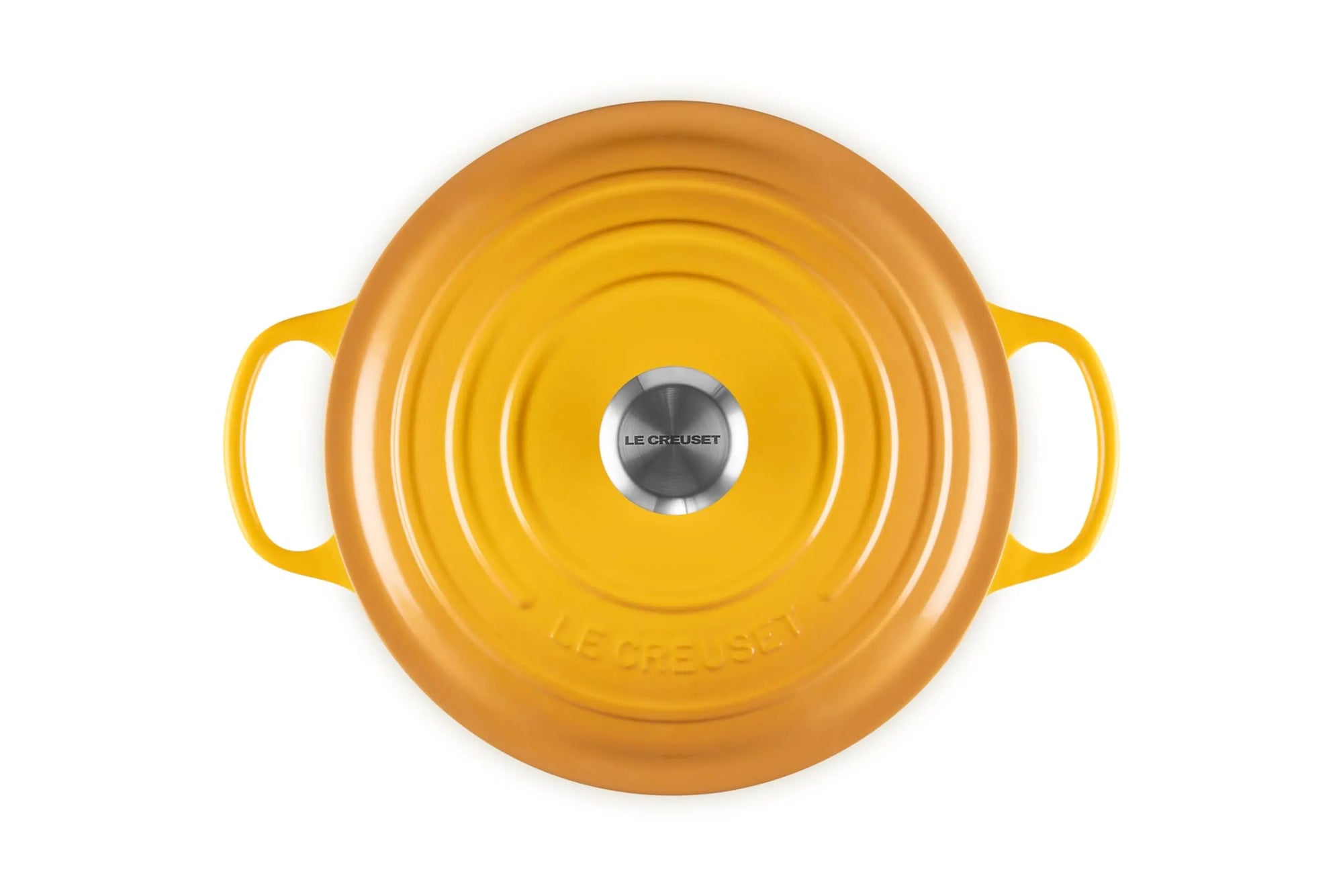 A top-down view of a Le Creuset round enameled cast iron pot with a matching lid, in a vibrant yellow color, set against a solid white background.