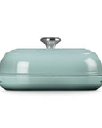Side view of Seasalt bread oven pan with lid and handles displayed on a white background
