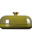 Side view of Olive bread oven pan with lid and handles displayed on a white background