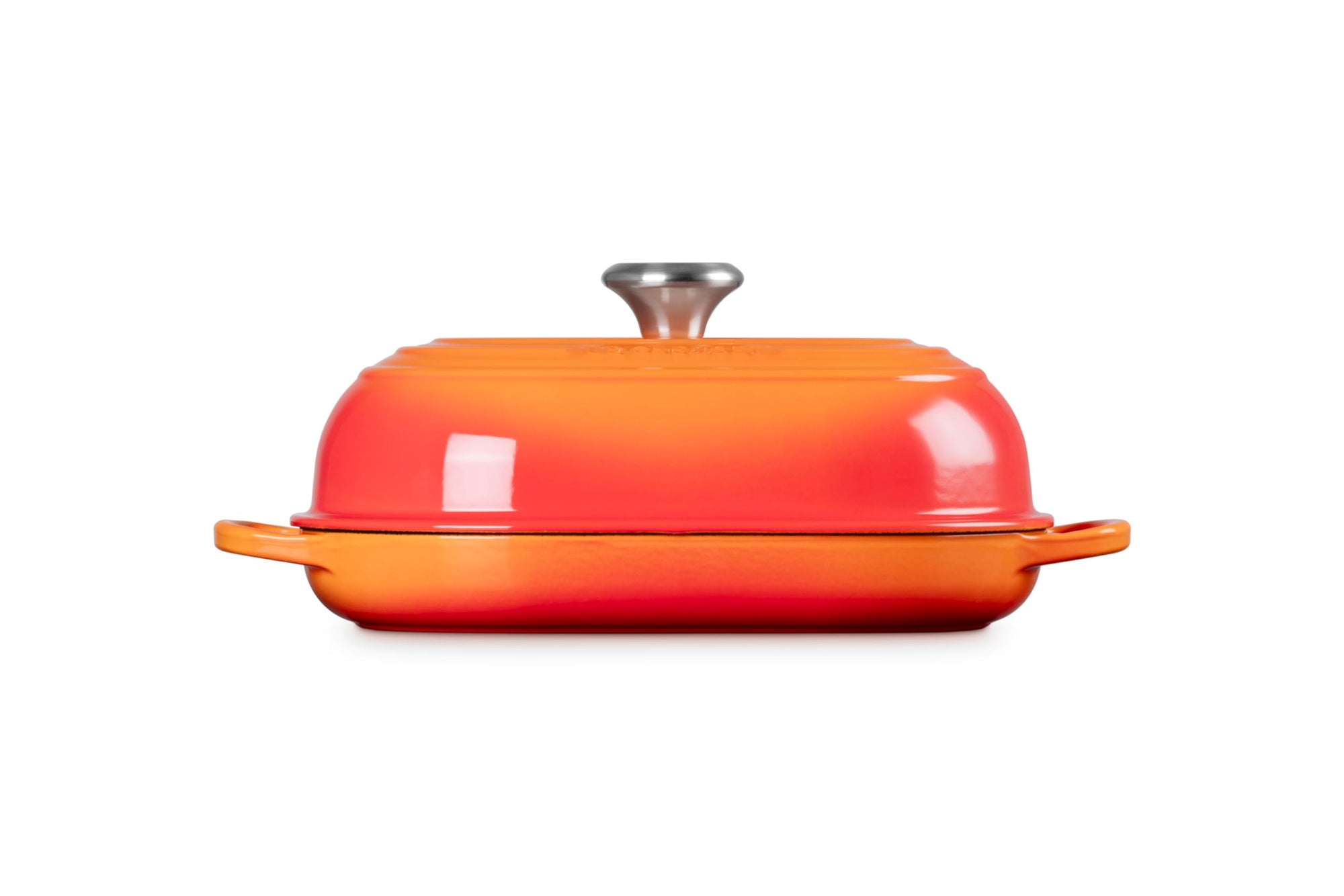 Side view of Flame bread oven pan with lid and handles displayed on a white background