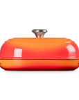 Side view of Flame bread oven pan with lid and handles displayed on a white background